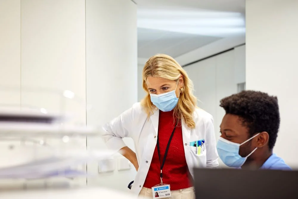 Two doctors with face masks on 