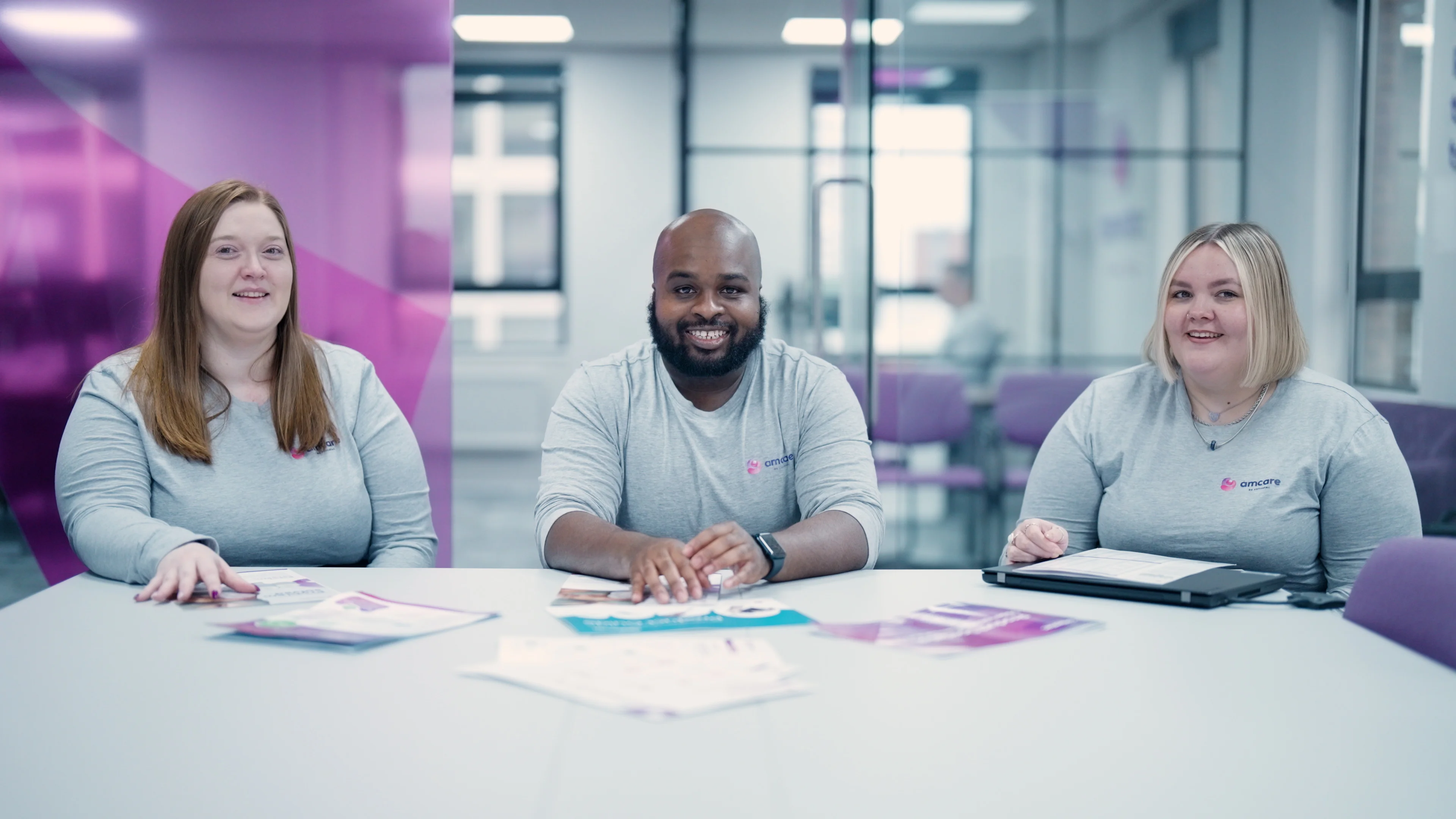 a group of people sitting at a table