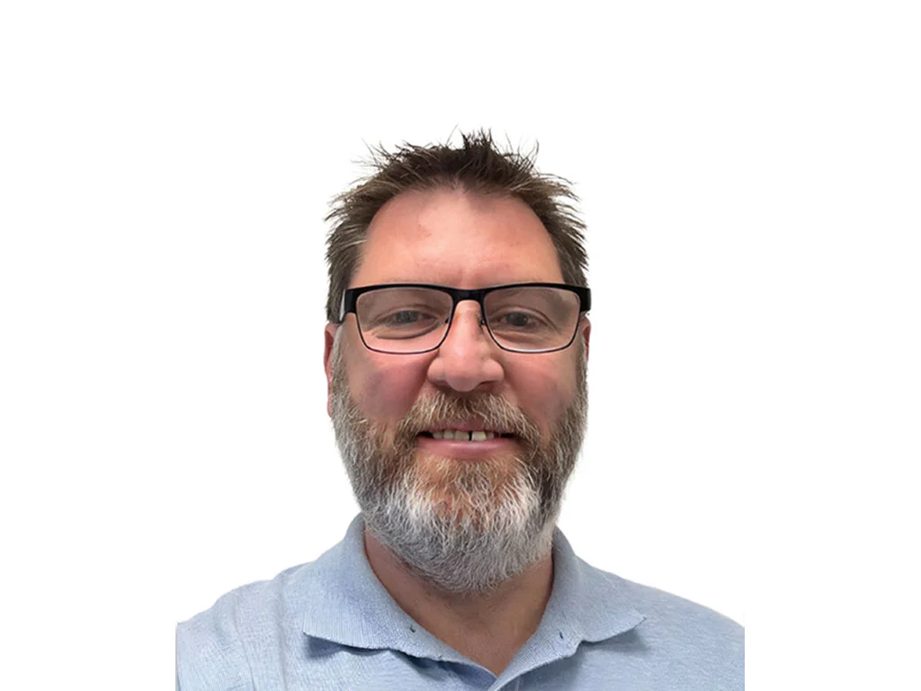 a man with a beard and glasses