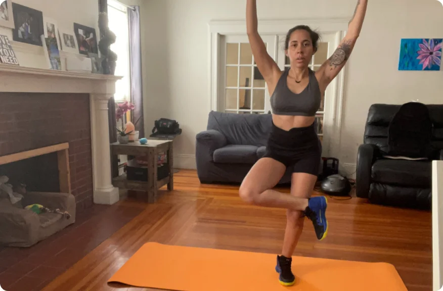 Woman doing Yoga at home.