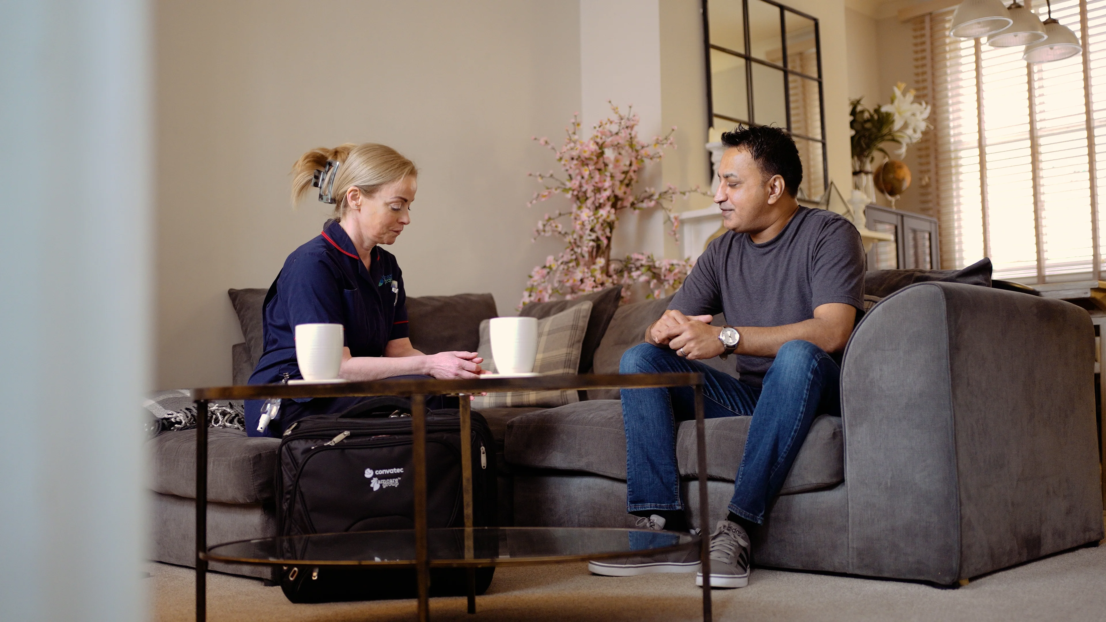 a man and a woman sitting on a couch